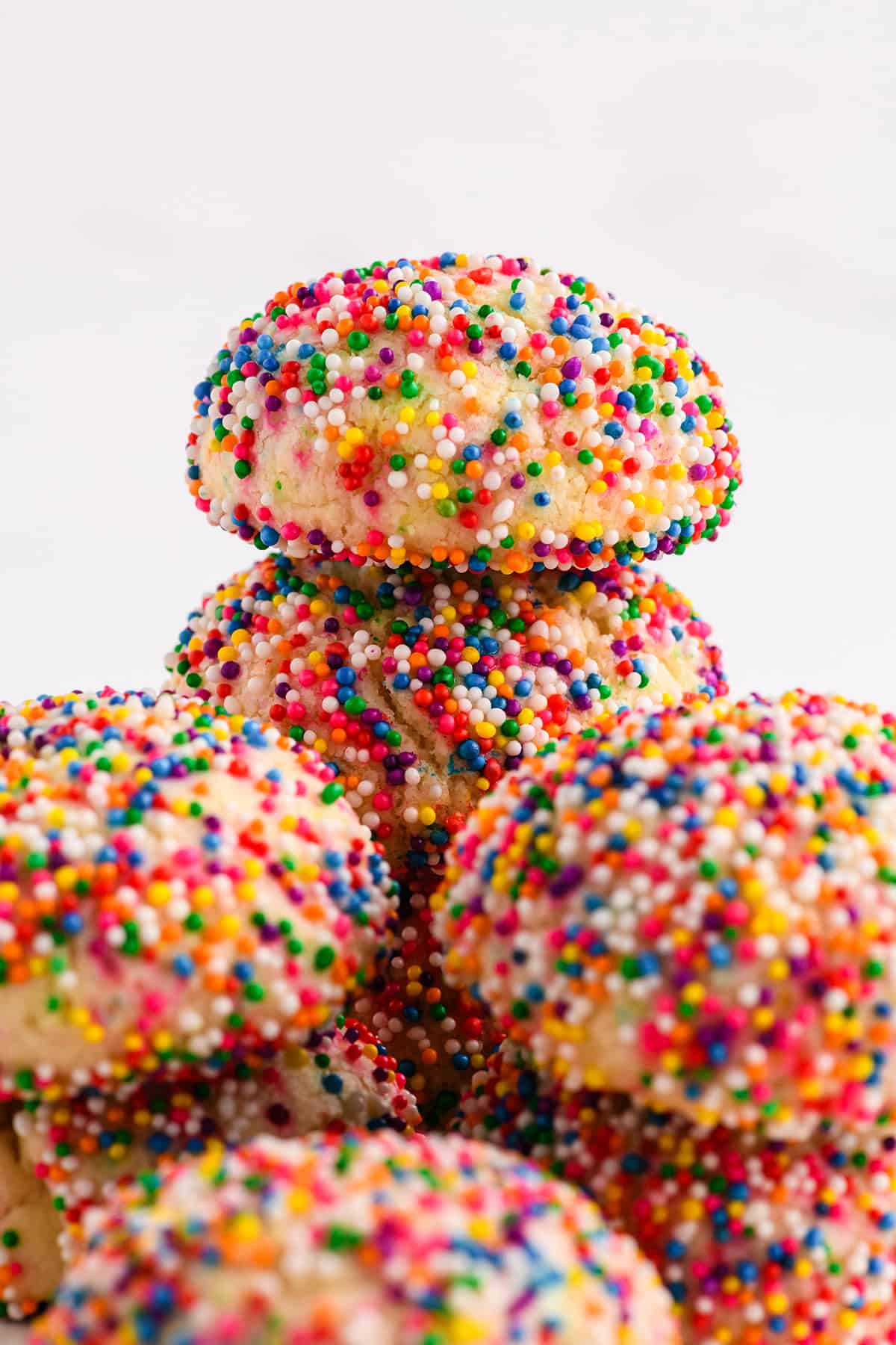 Ultra close up of stacks of Mexican Sprinkle Cookies.