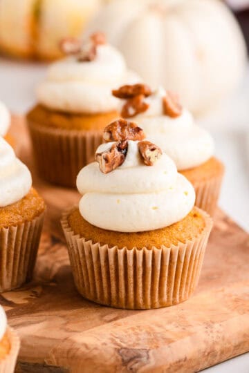 Cover image for Pumpkin Cupcakes with Maple Cream Cheese Frosting.