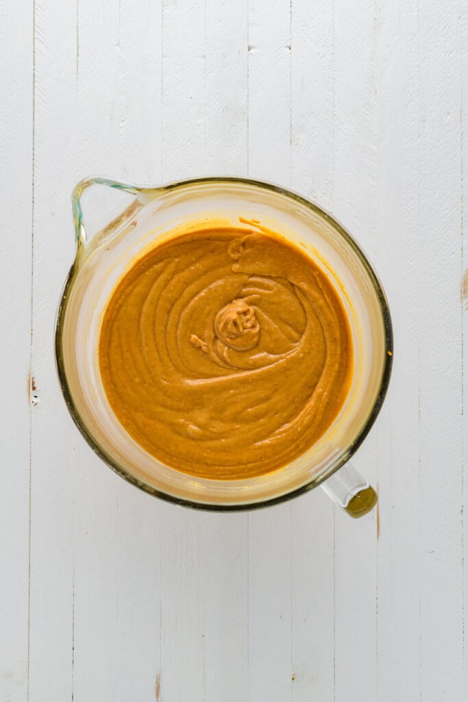 Overhead shot of completed cupcake batter for Pumpkin Pie Cupcakes.