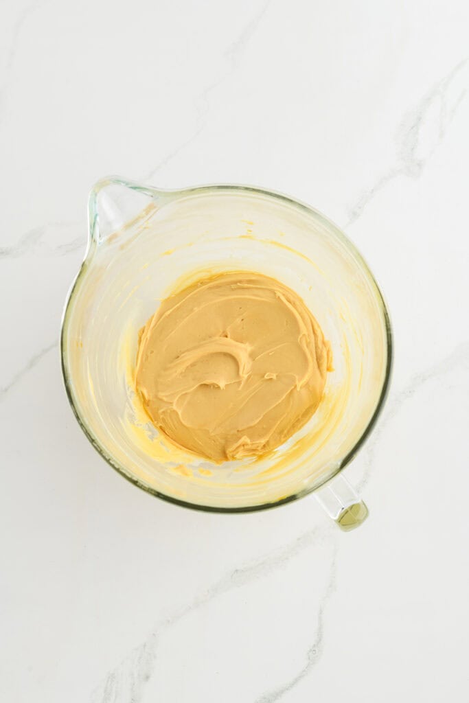 Overhead shot of completed caramel cream cheese frosting for  Pumpkin Spice Layer Cake.