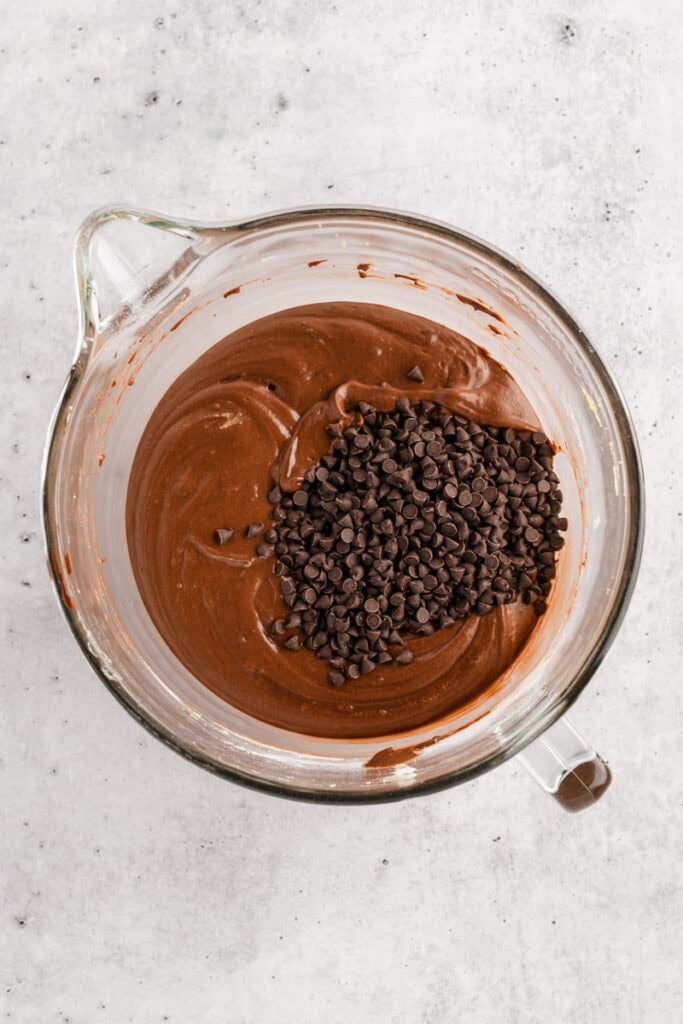 Overhead shot of completed cake batter for Chocolate Peppermint Layer Cake.