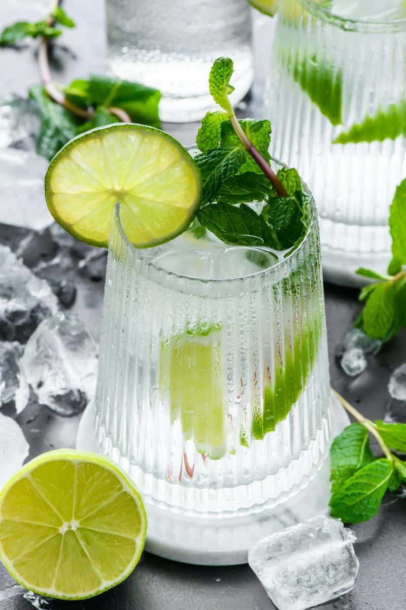 Refreshing Hangover Cure garnished with lime and mint leaves. 