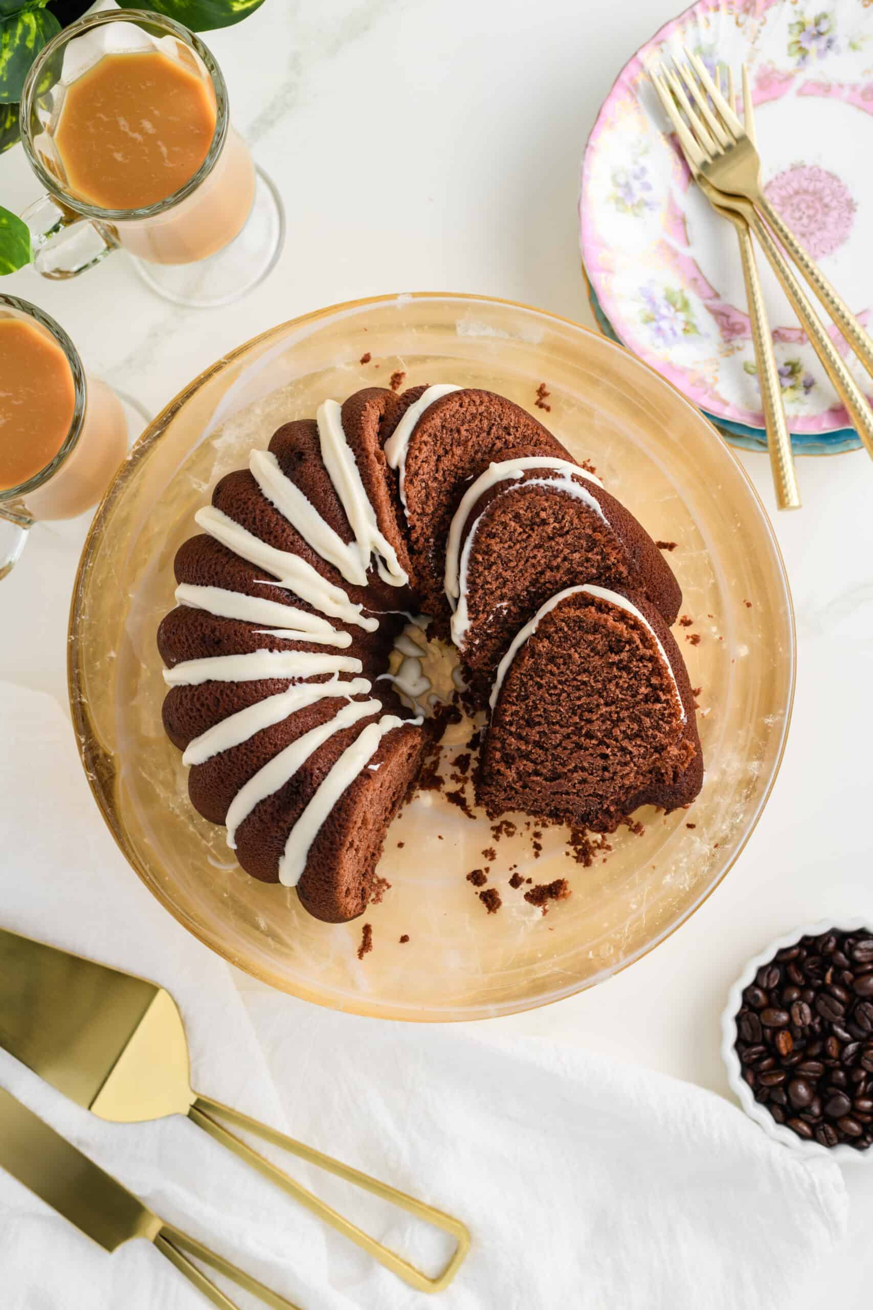 Overhead shot of sliced Healthier Chocolate Coffee Cake on cake stand.