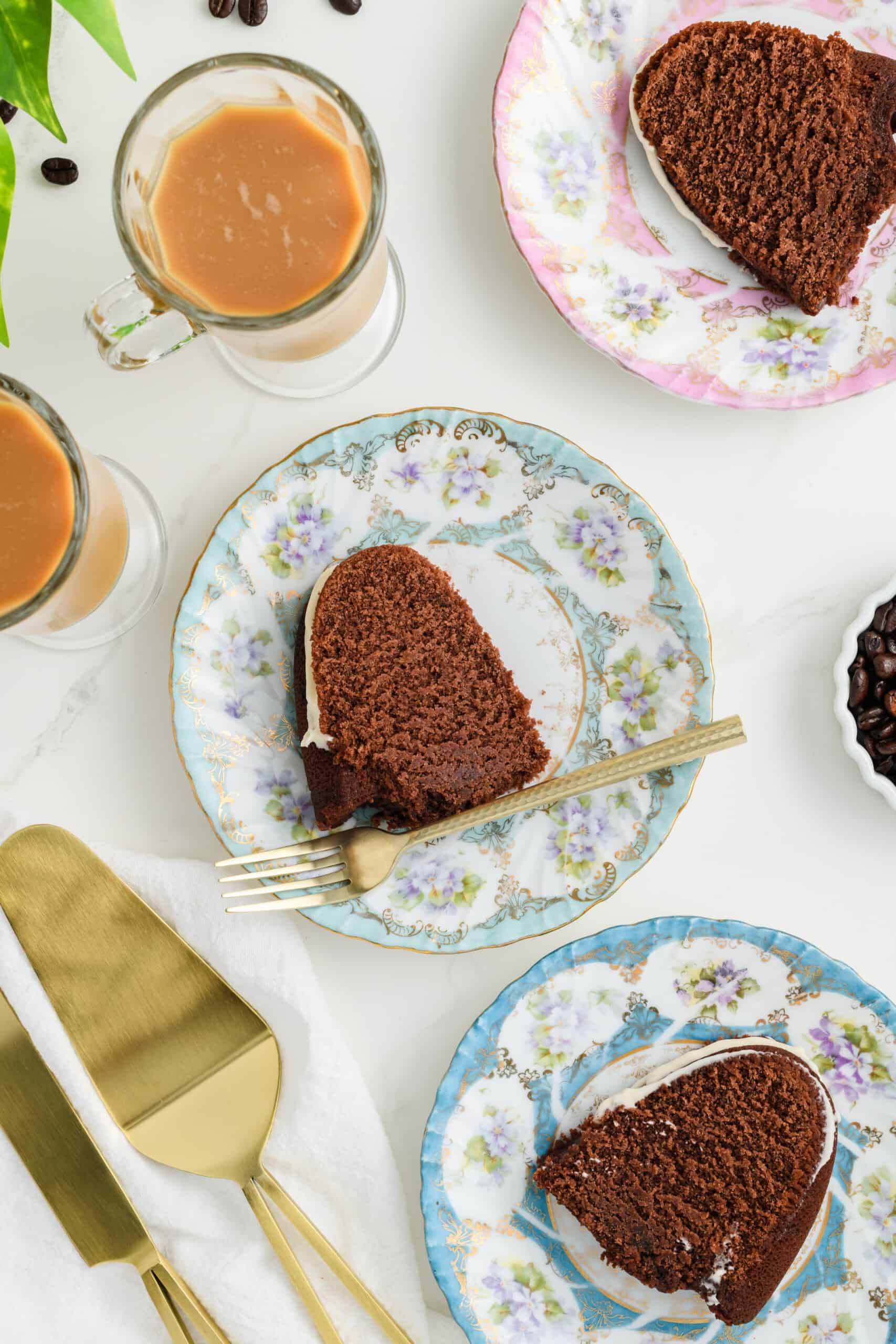 Overhead shots of Healthier Chocolate Coffee Cake slices on plates.