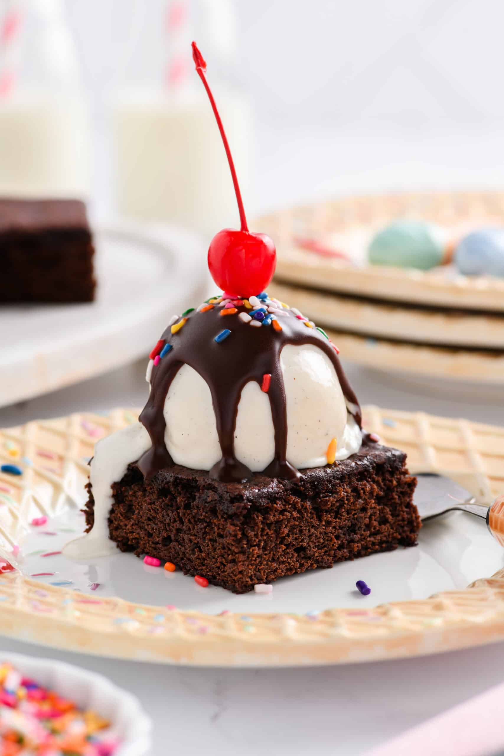 Close up shot of one brownie with one scoop of ice cream for Lightened Up Brownie a la Mode.