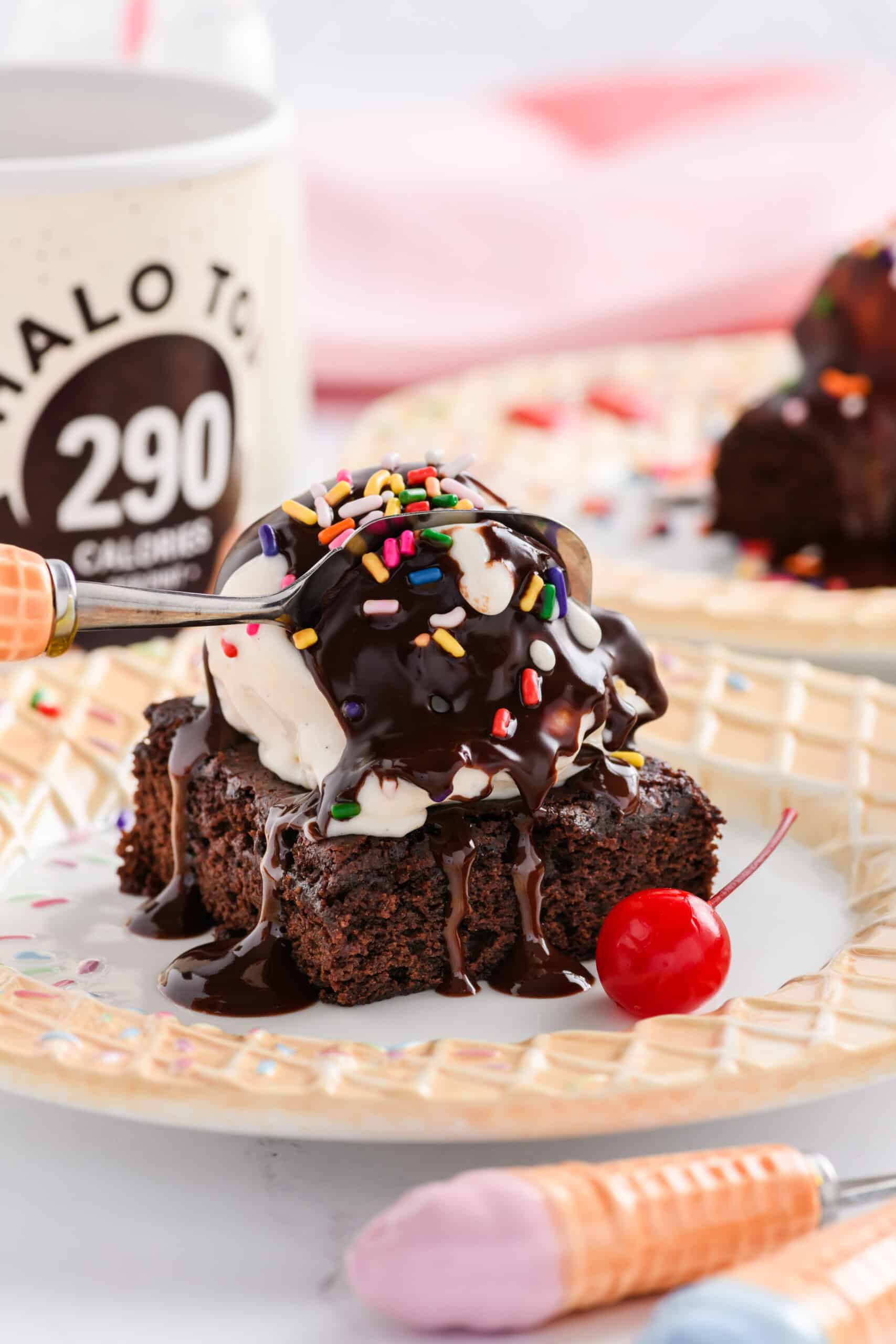 Close up shot of spoon digging into Lightened Up Brownie a la Mode.
