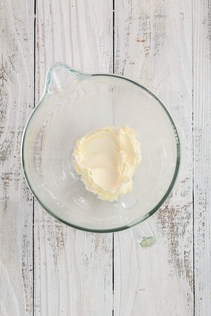 Overhead shot of creamed butter and sugar for Valentine Confetti Cookie Cake.