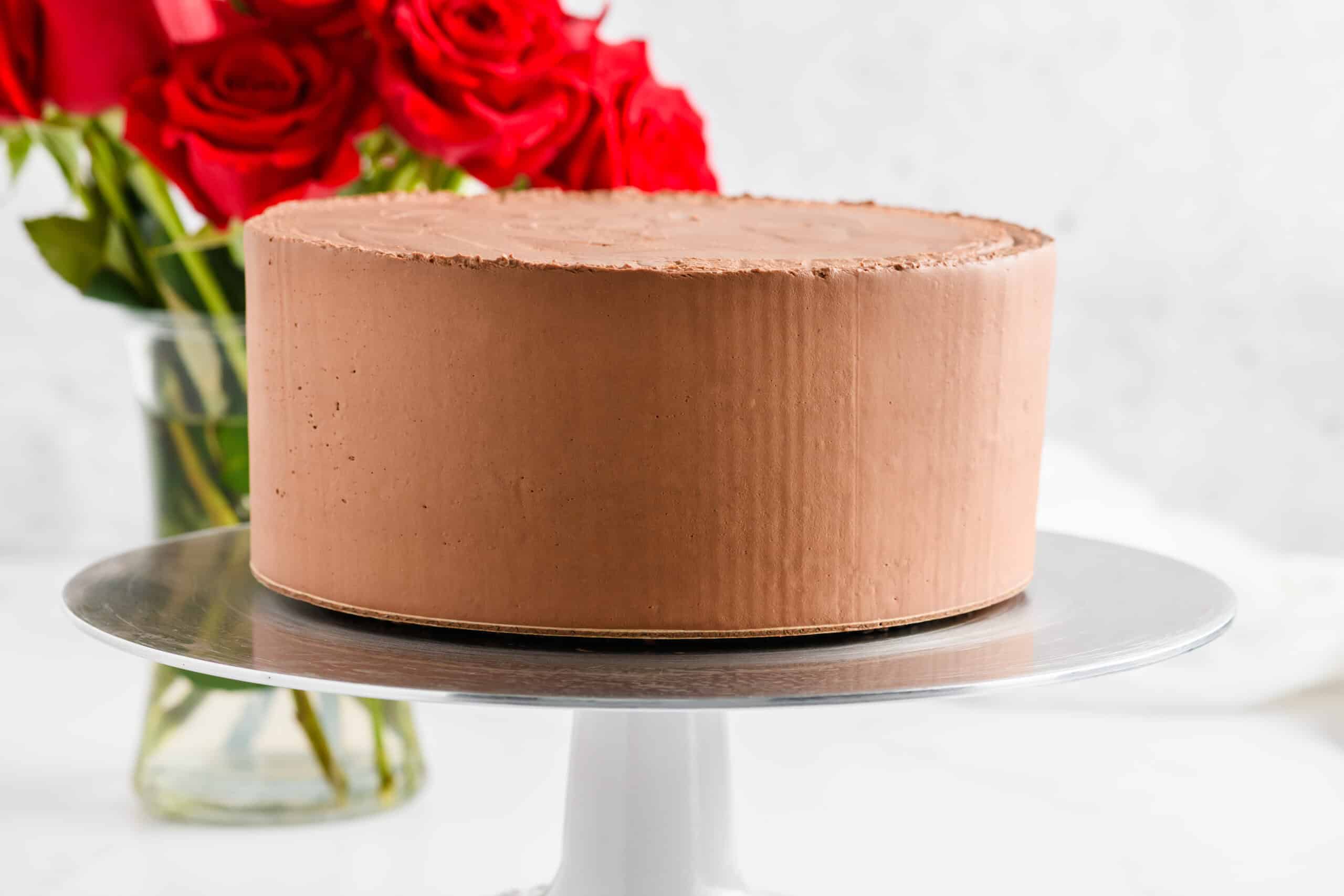 Frosted Chocolate Raspberry Cake with Whipped Ganache Frosting.