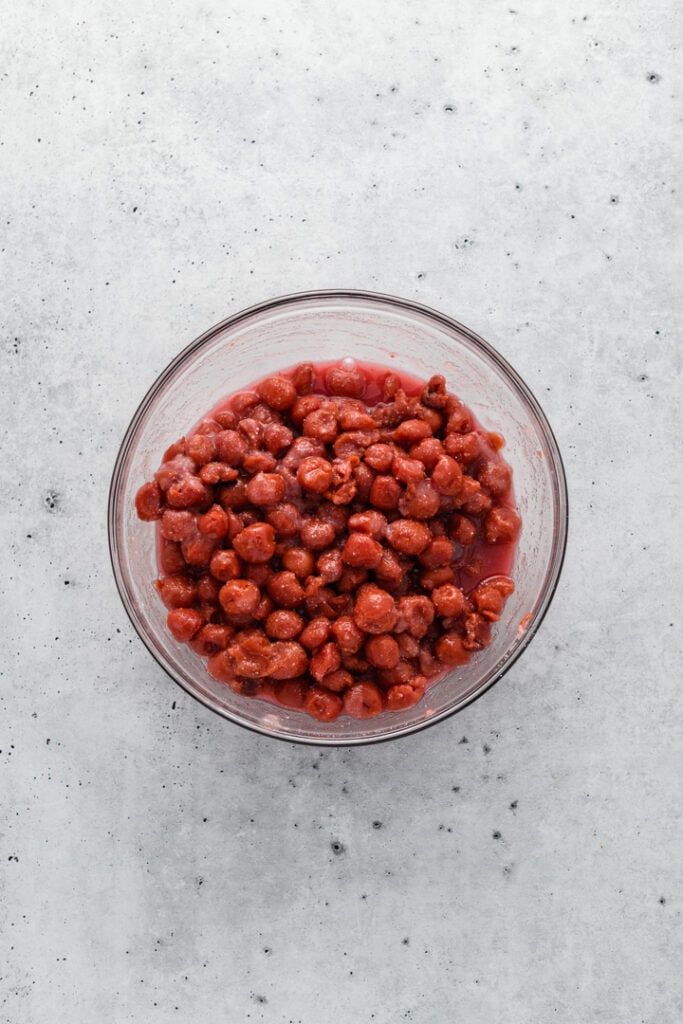 Overhead image of cherry mixture in a bowl for Easy Cherry Pie.