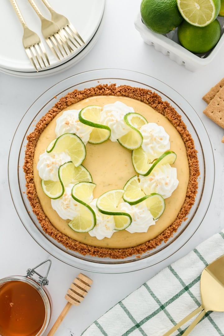Overhead shot of complete Key Lime Pie in pie plate.