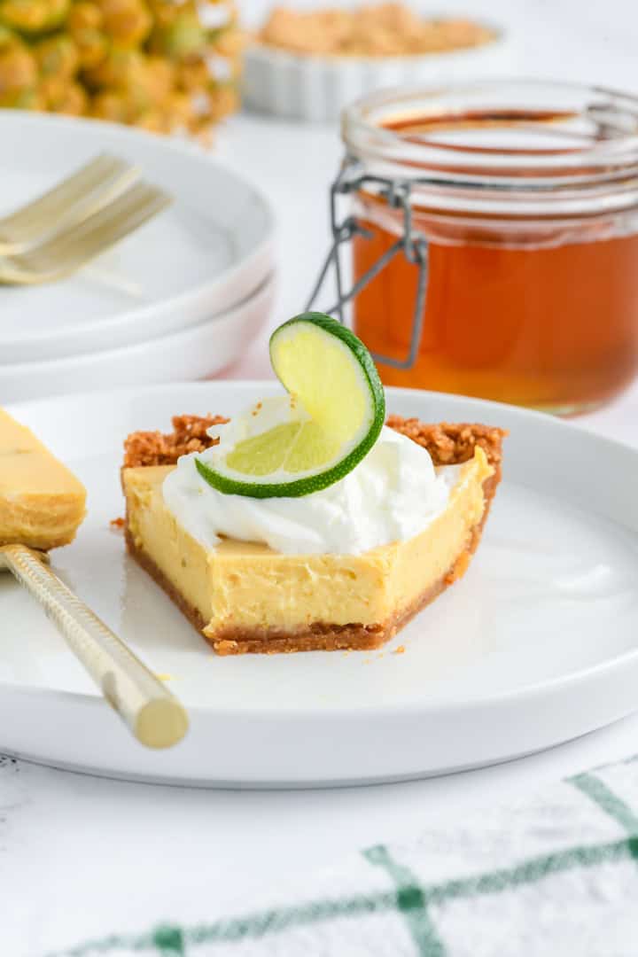 Close up shot of cut Key Lime Pie slice.