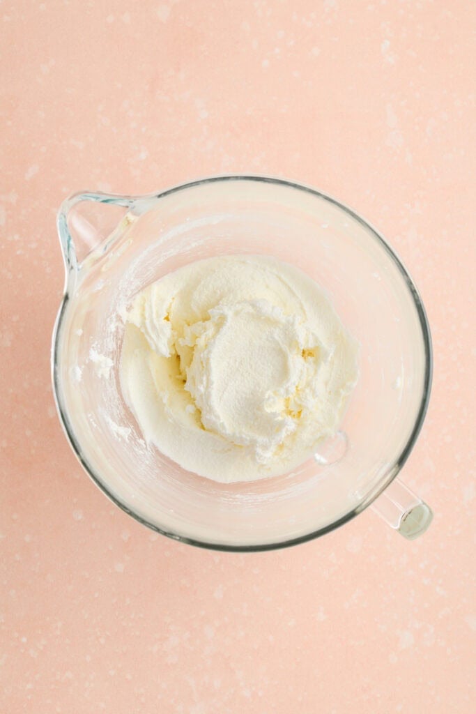 Overhead shot of creamed butter and sugar for Amaretto Bundt Cake.