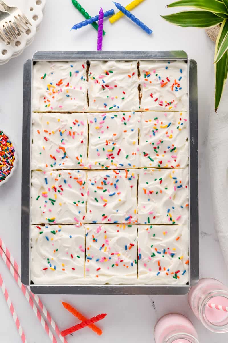 Overhead shot of sliced Funfetti Sheet Cake.