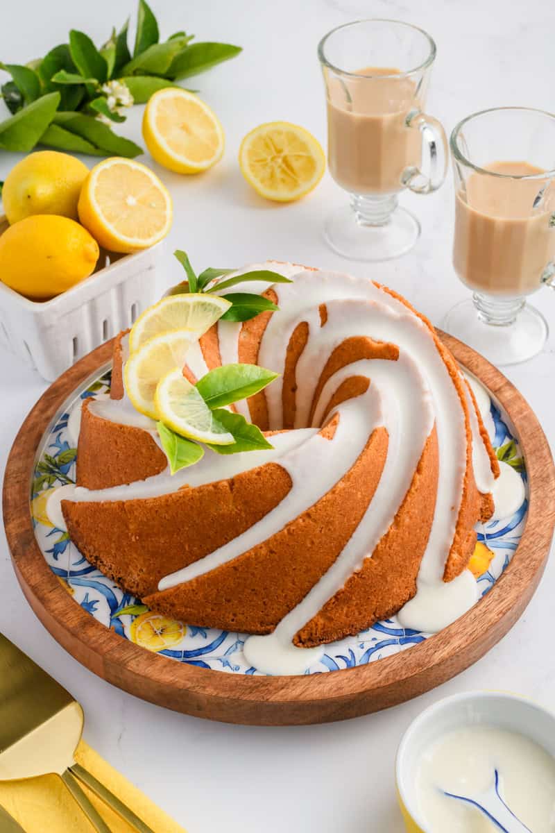 Angled Lemon Bundt Cake on platter.