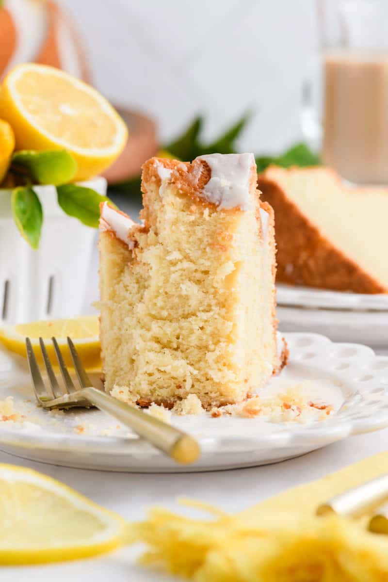 Slice of Lemon Bundt Cake with bite removed.