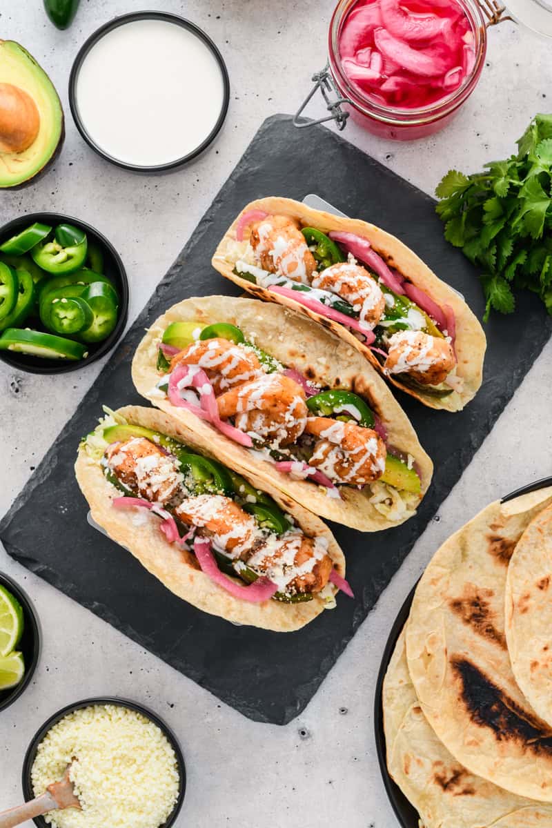 Overhead shot of Easy Shrimp Tacos in taco holder.
