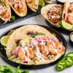 Easy Shrimp Tacos on black plate.