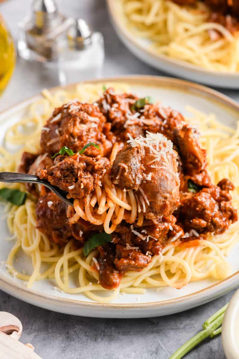 Close up of Italian Sausage Spaghetti twirled on fork.