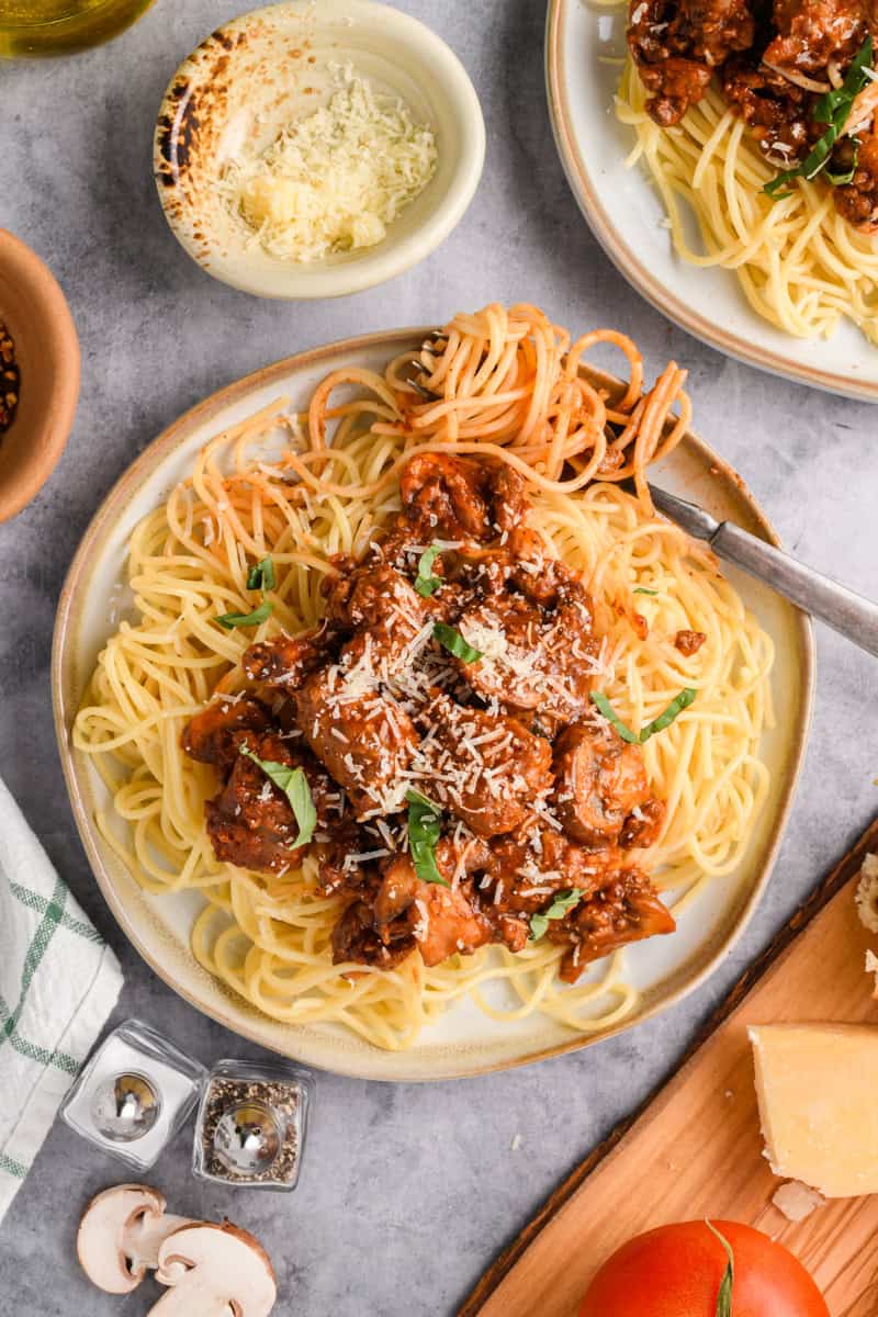 Overhead shot of Italian Sausage Spaghetti with twirled pasta on fork.