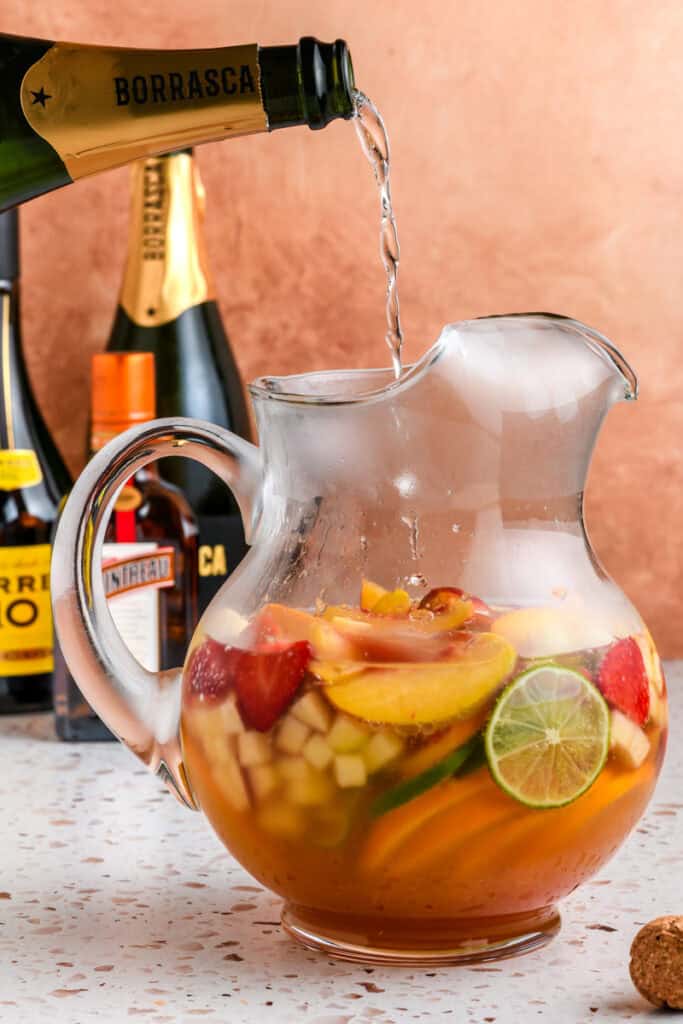 Cava going into the pitcher for Sparkling Sangria.