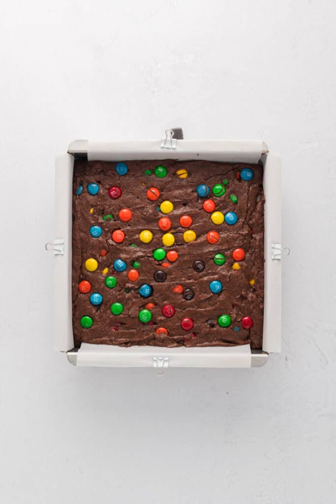 Overhead shot of baked M&M Brownies in baking pan.