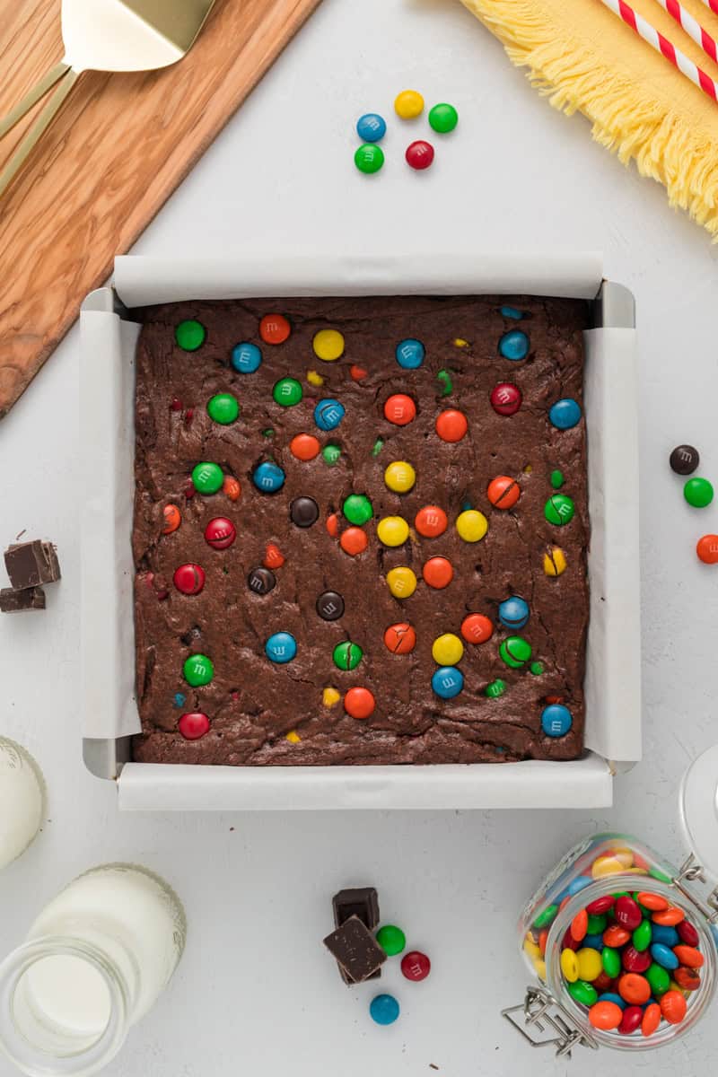 Overhead shot of baked M&M Brownies in baking pan.