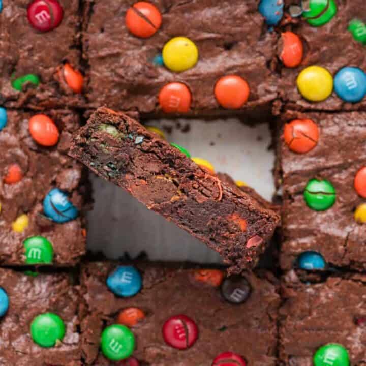 Close up overhead shot of side of M&M Brownies in baking pan.