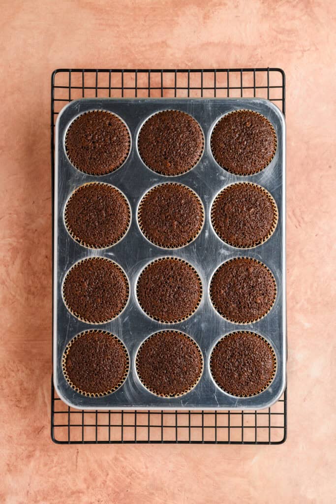 Overhead shot of baked Gingerbread Cupcakes in cupcake pan.