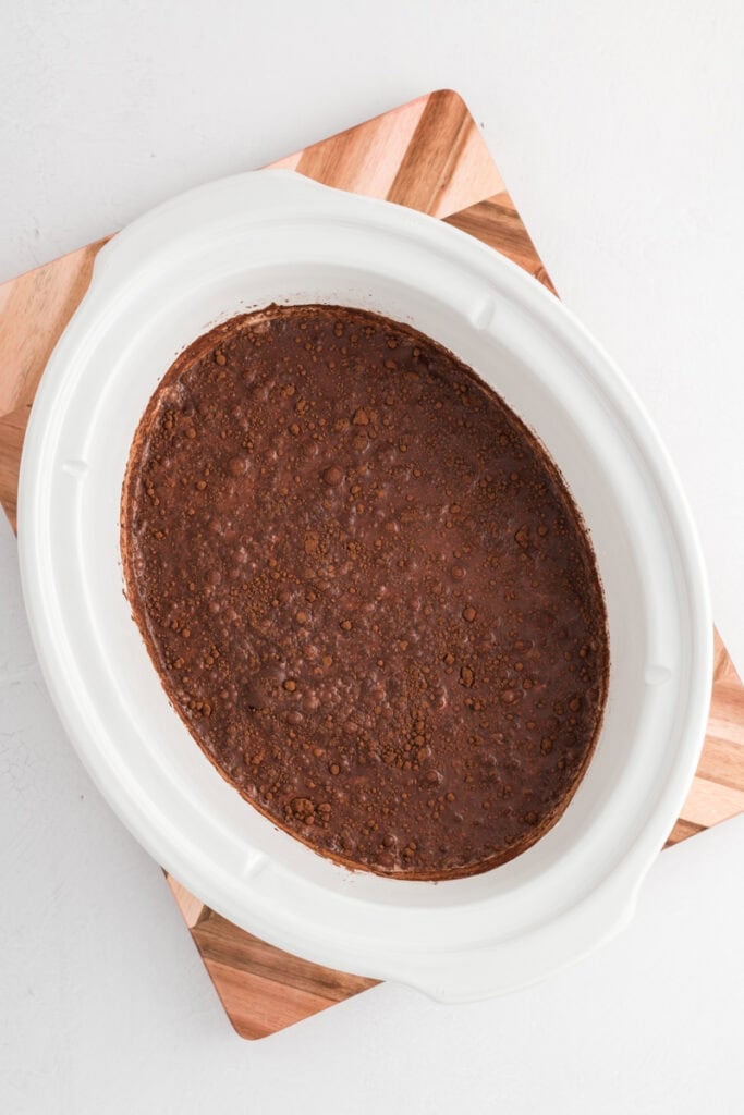 Overhead process shot of ingredients combined for Slow Cooker Hot Chocolate.